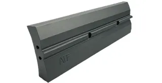 Manganese blow bar with TiC inserts